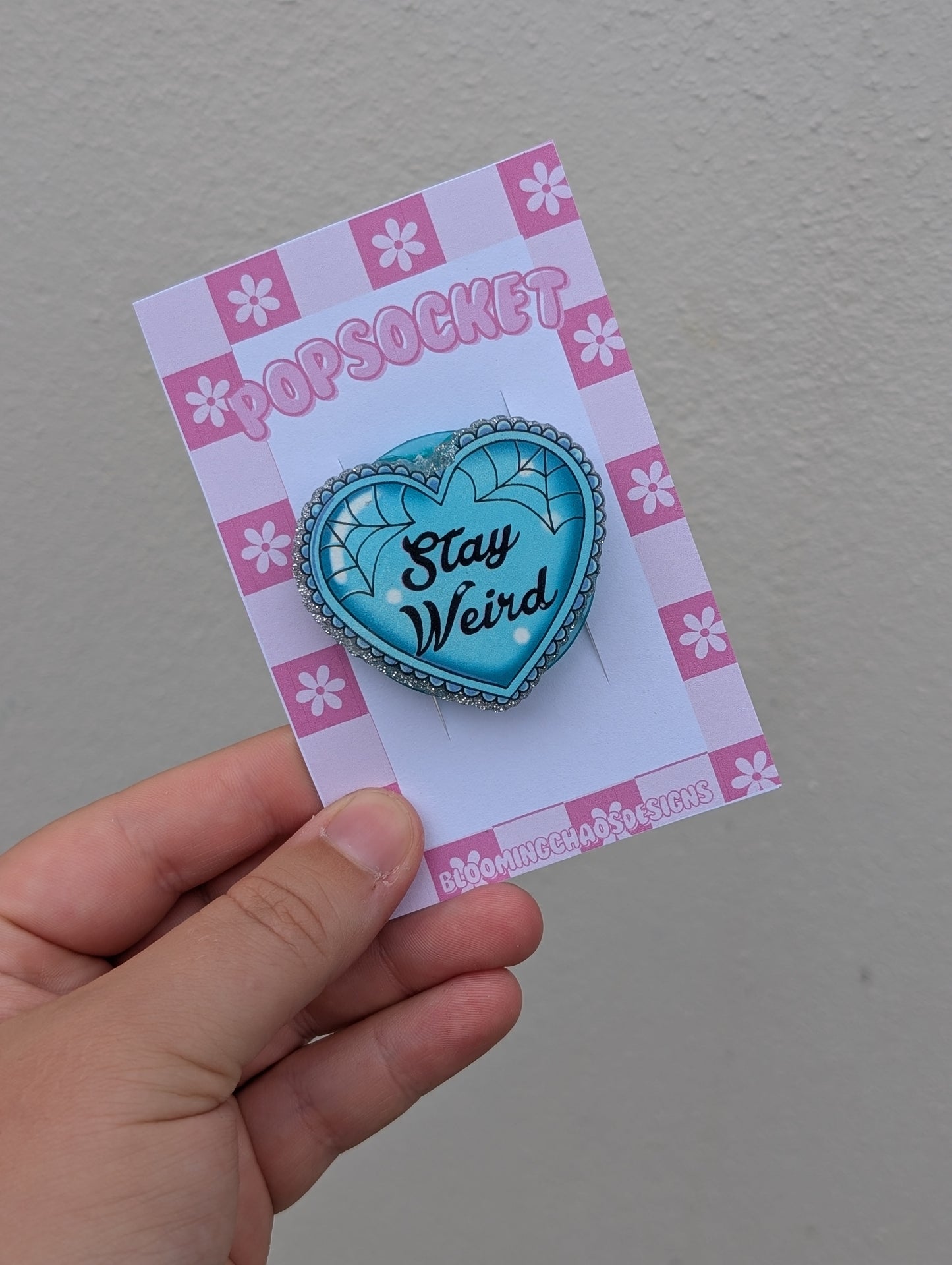 Stay weird pop socket