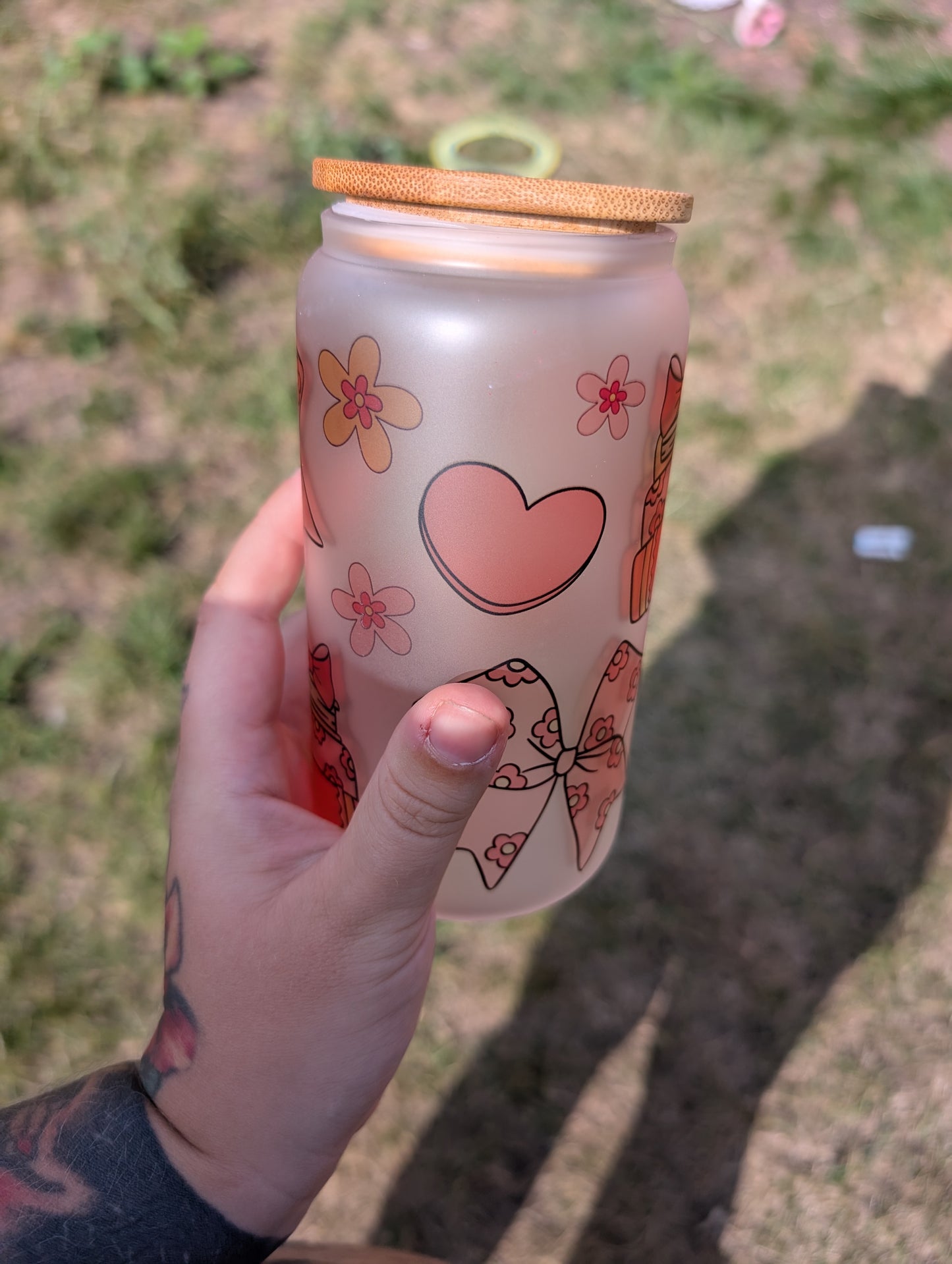 Bows and books style glass can