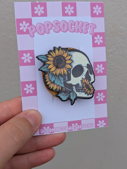 Skull and flower head pop socket