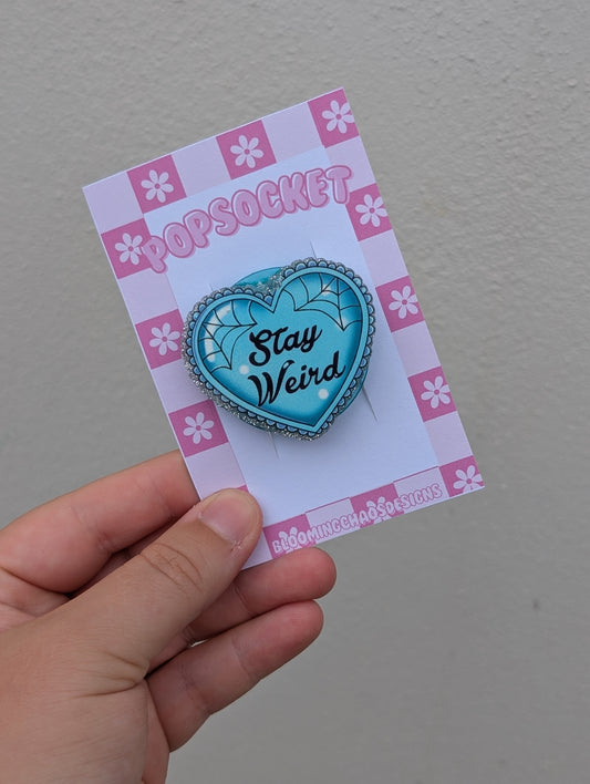 Stay weird pop socket
