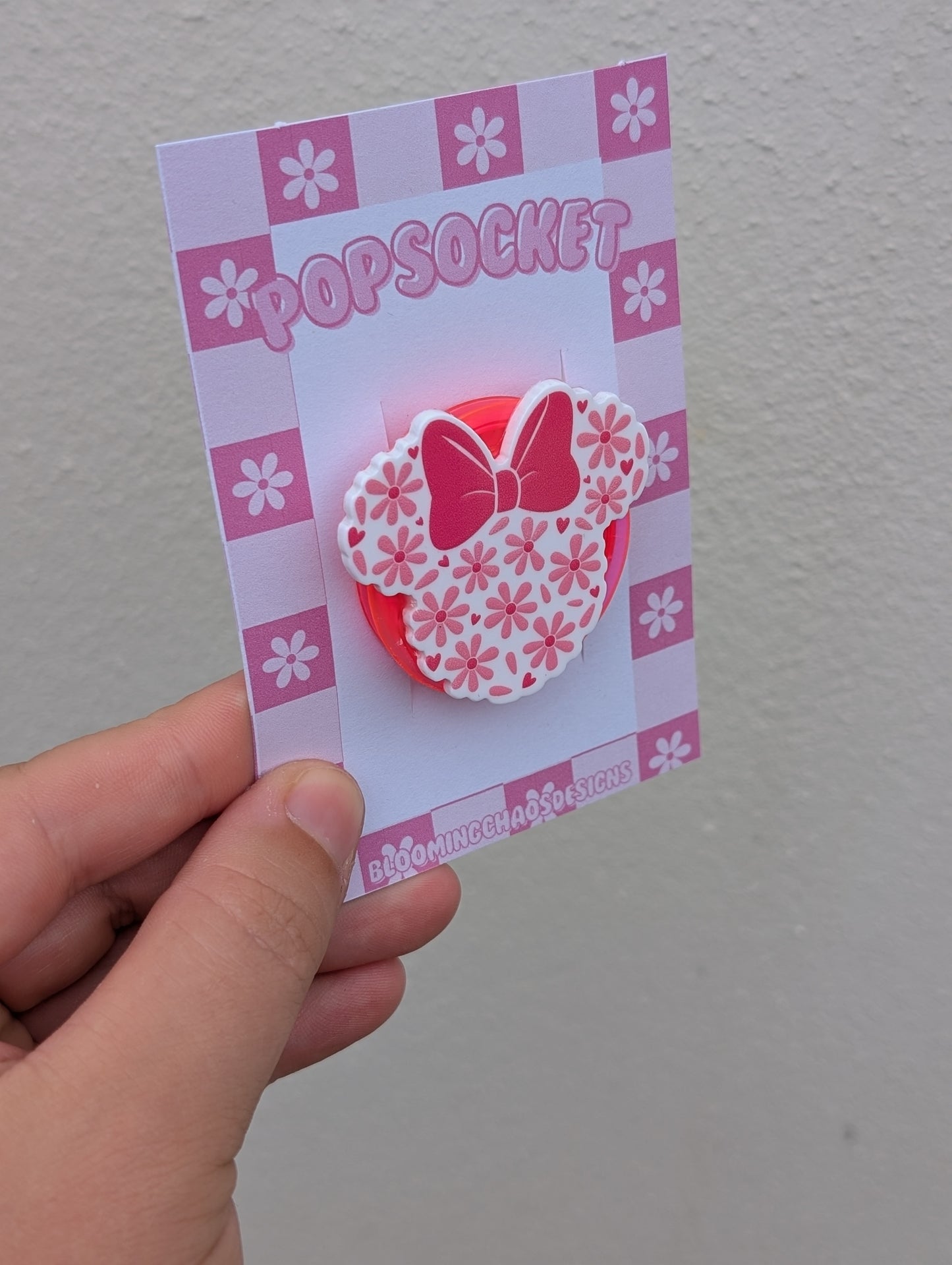 Bow and flower head pop socket