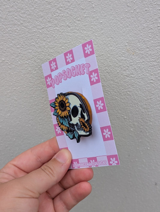 Skull and flower head pop socket