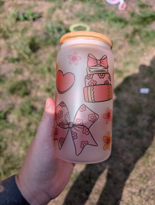Bows and books style glass can