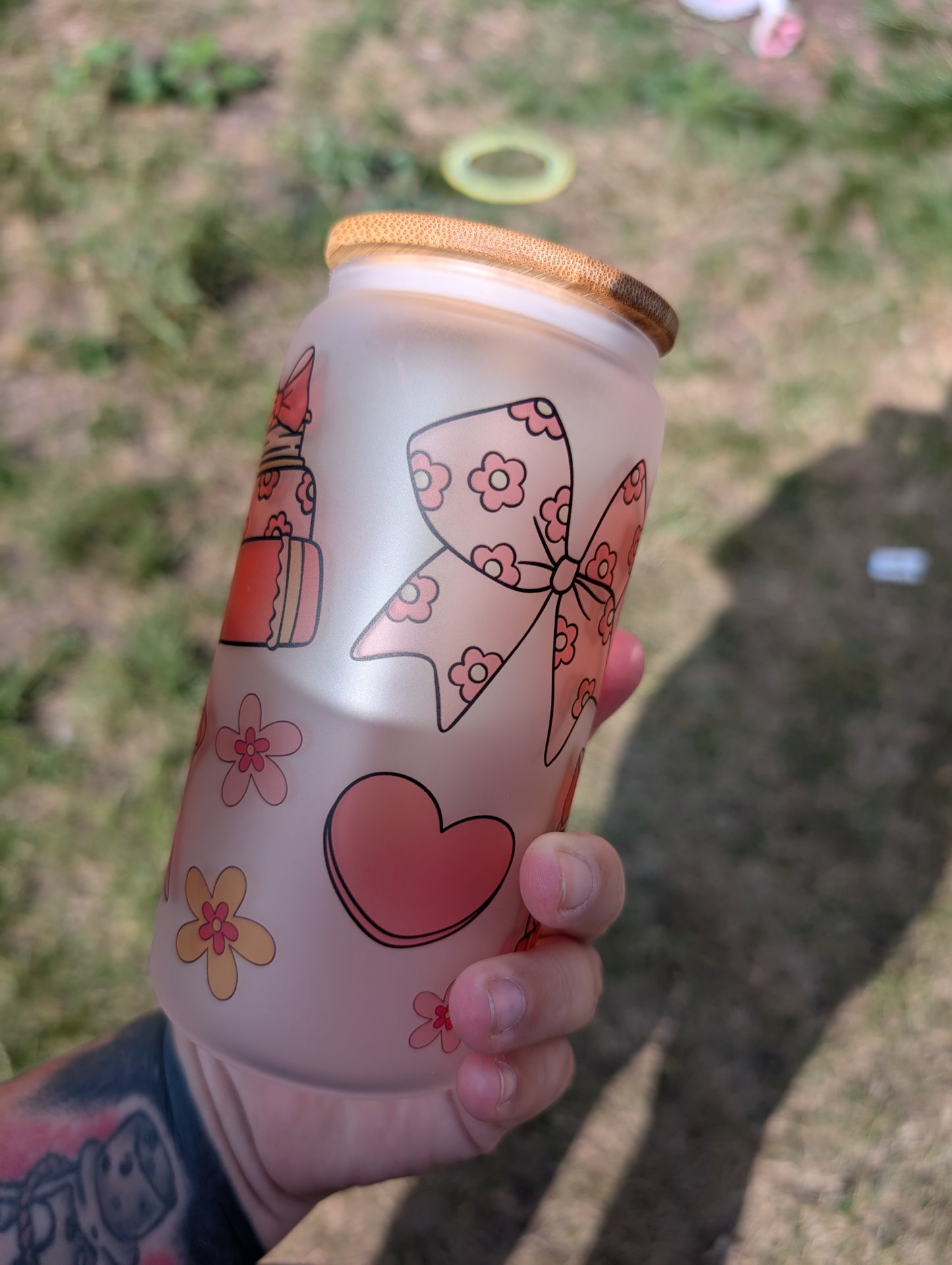 Bows and books style glass can