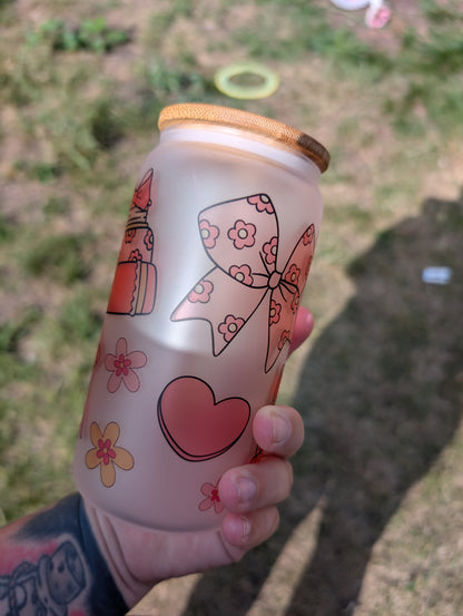 Bows and books style glass can